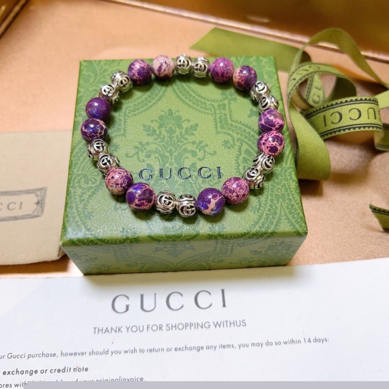 G*u*i bracelets